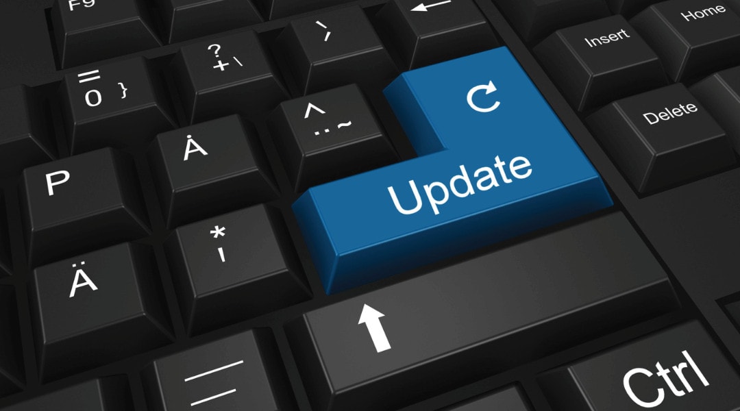 keyboard that has a blue update refresh key in place of the enter key.