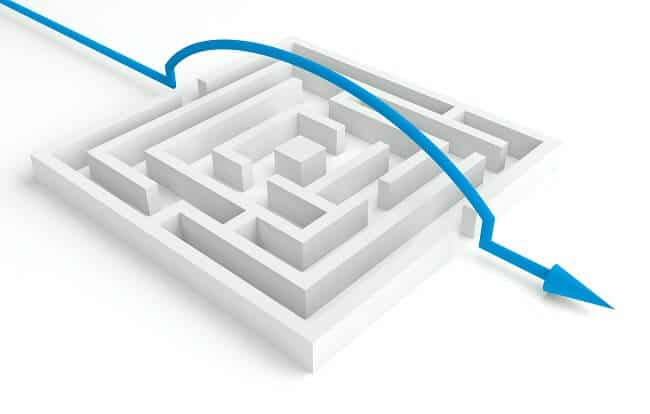 a blue arrow going over a maze
