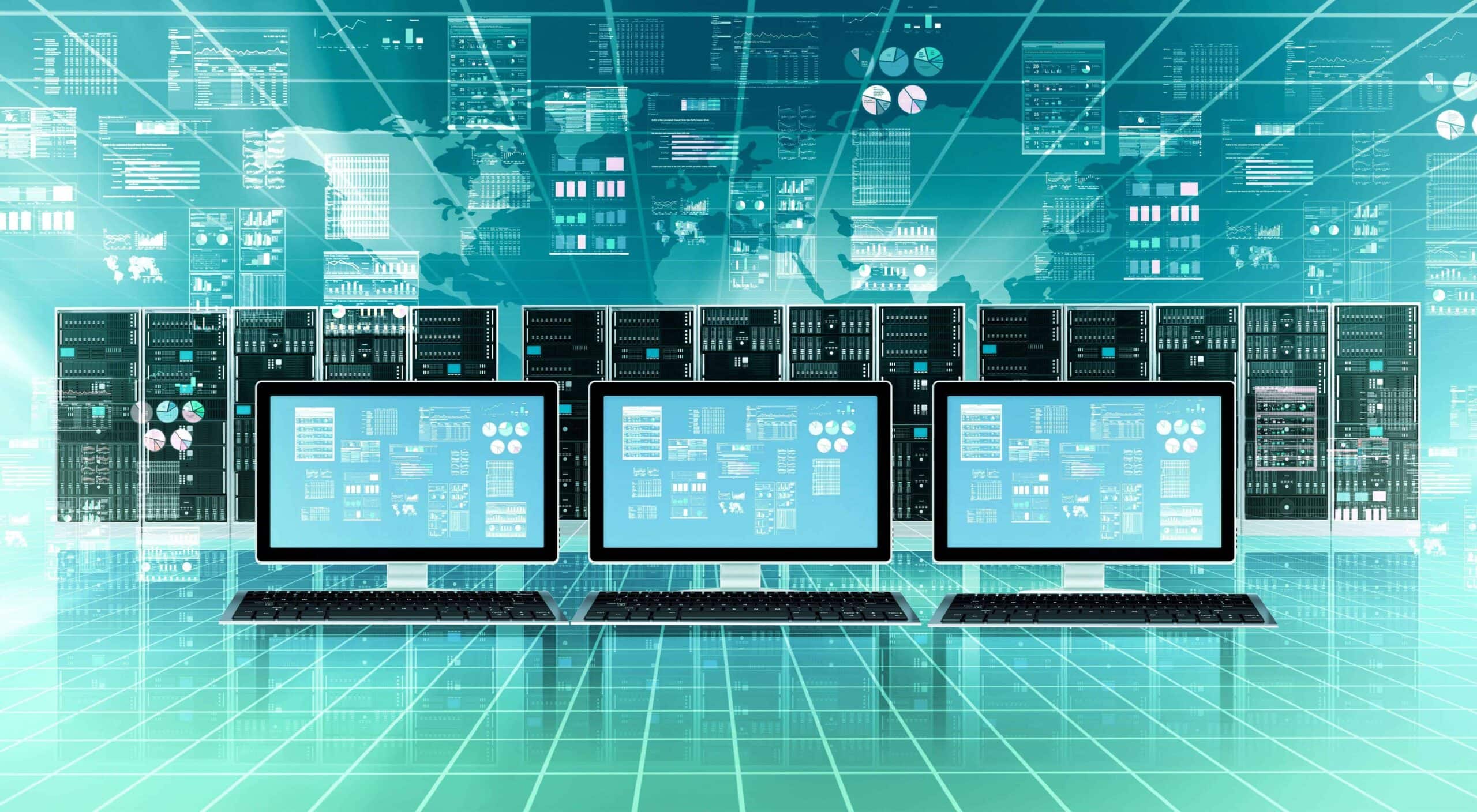 three desktop computers lined up in front of multiple physical servers