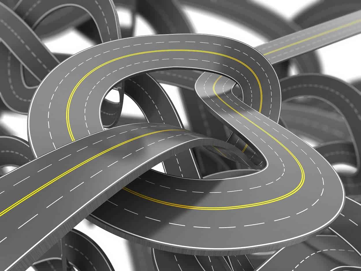 Flexible pavement twisting into notes against a white background