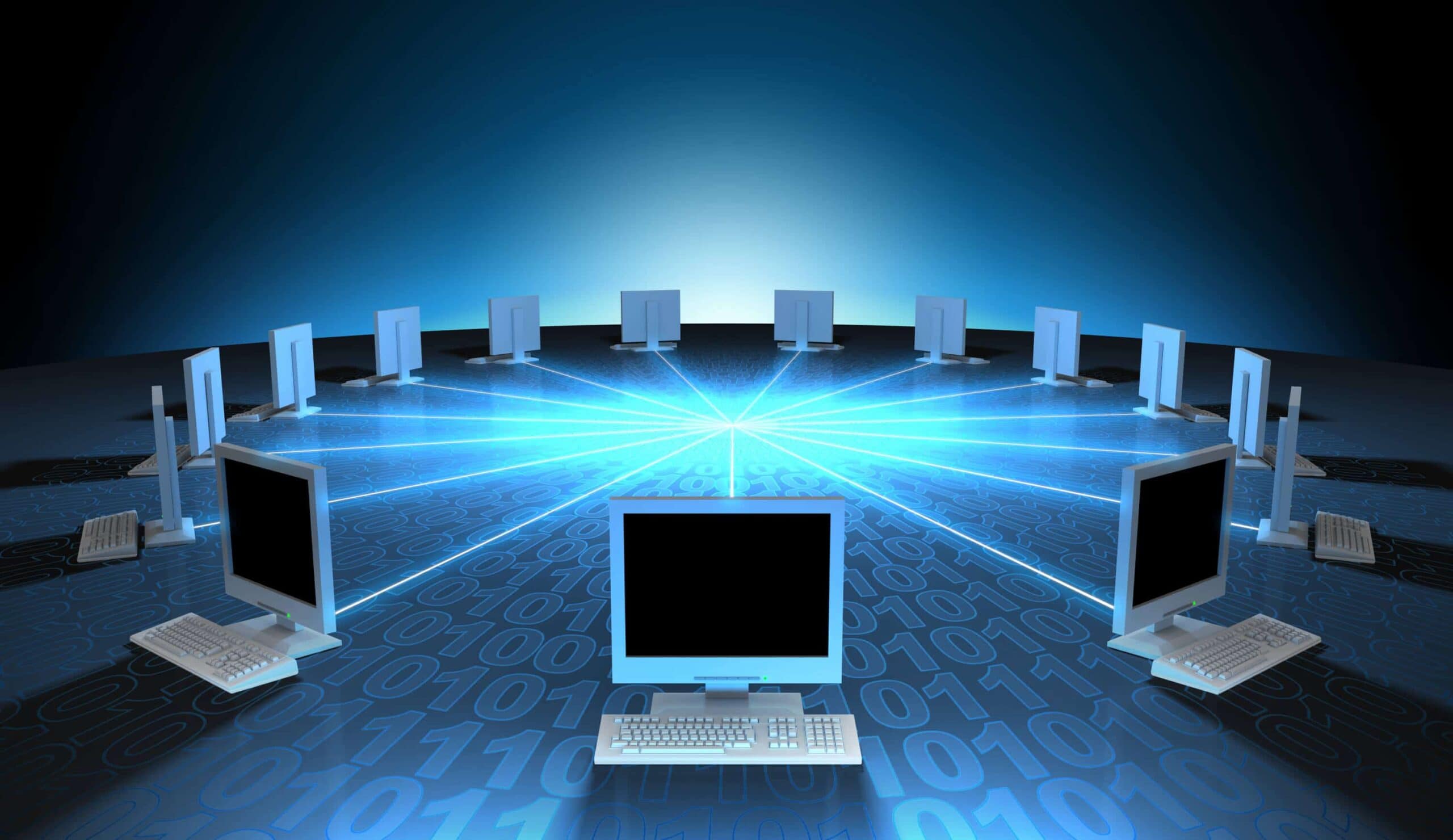 several desktop monitors in a circle all connected by a blue LED line