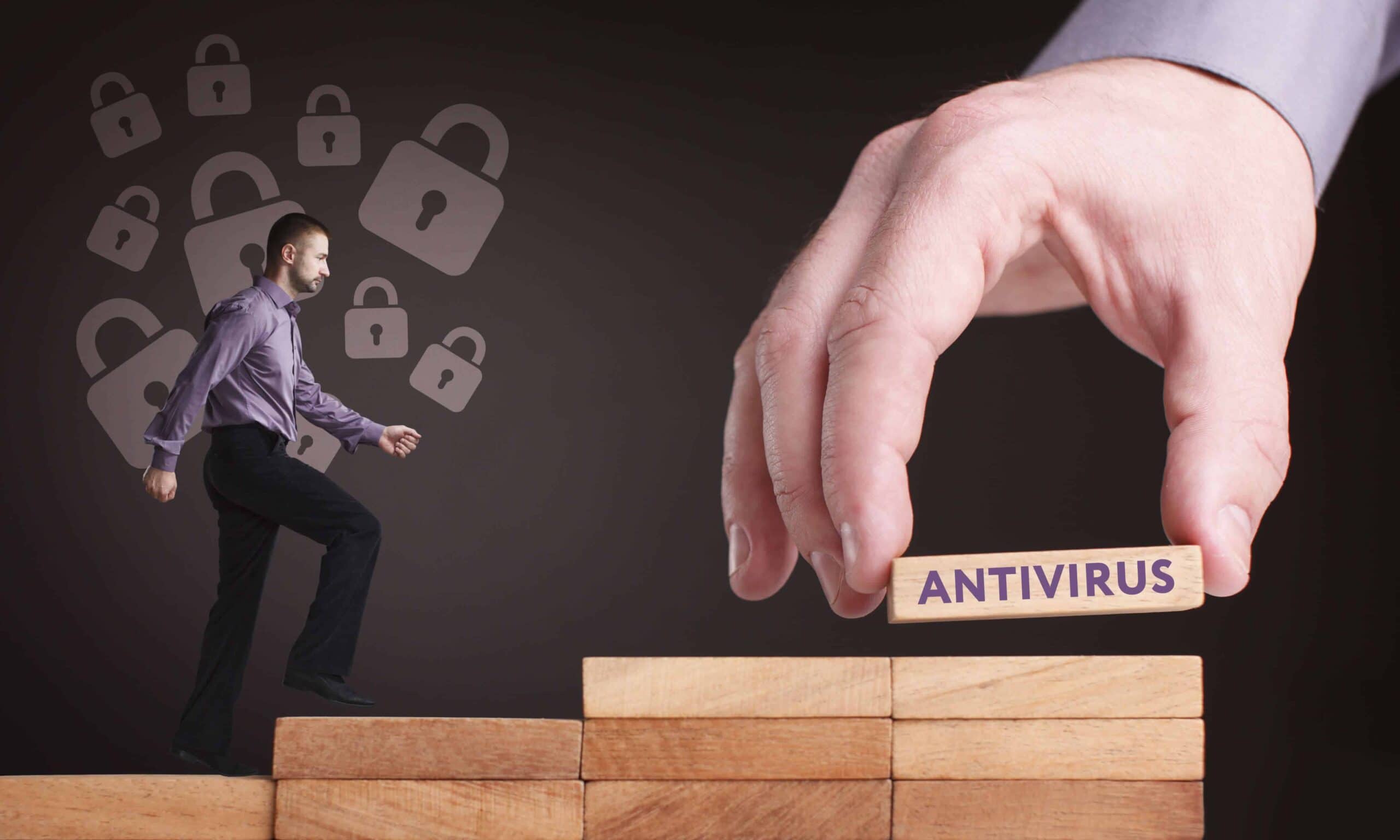 Man walking up wooden blocks with locks floating in the behind him, while a giant hand places an antivirus block at the top.
