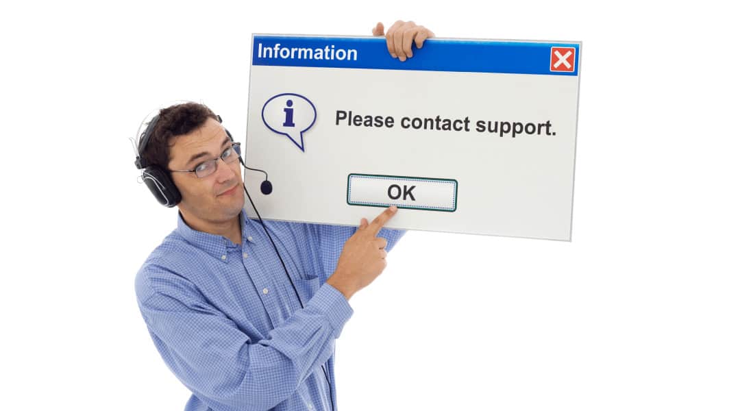 IT professional holds up sign that says "please contact support"