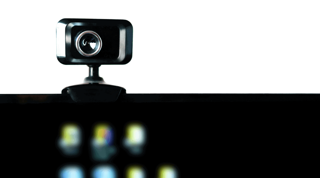 close up of a camera attached to the top of a monitor screen