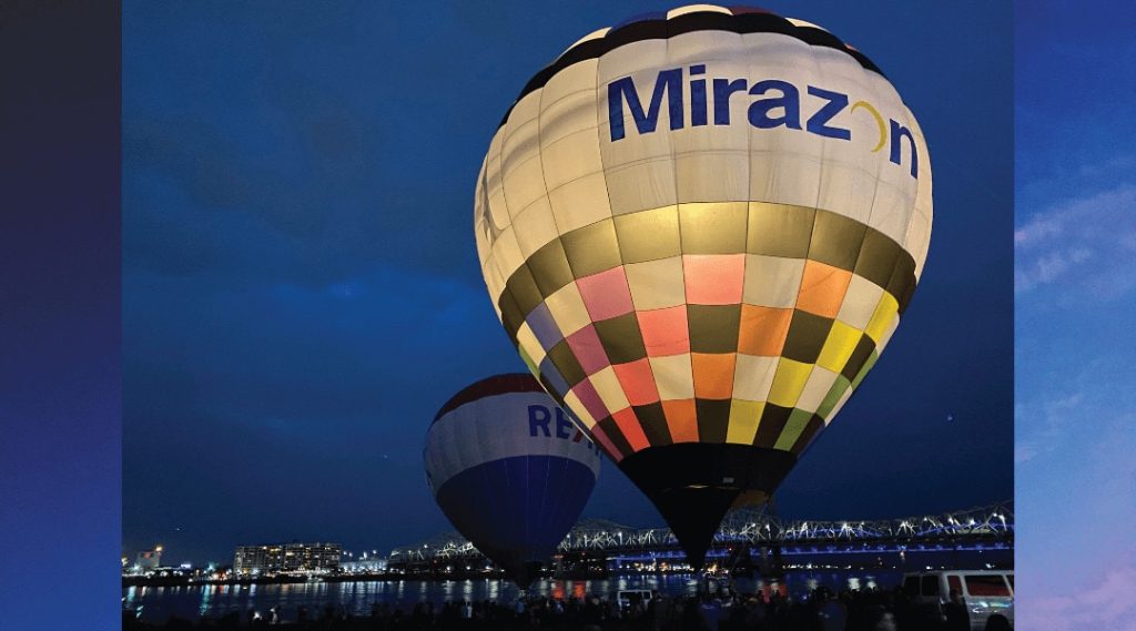 Colorful Hot Air Balloon Taking Off With "Mirazon" On the Side