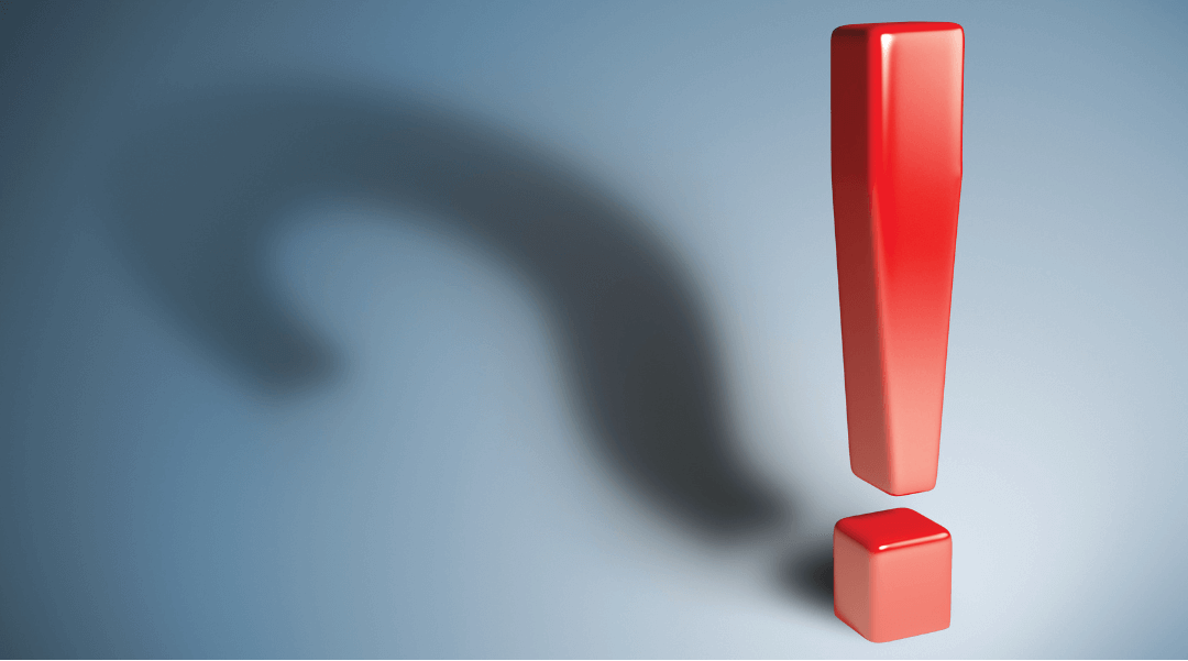 A red exclamation mark with a question mark as a shadow