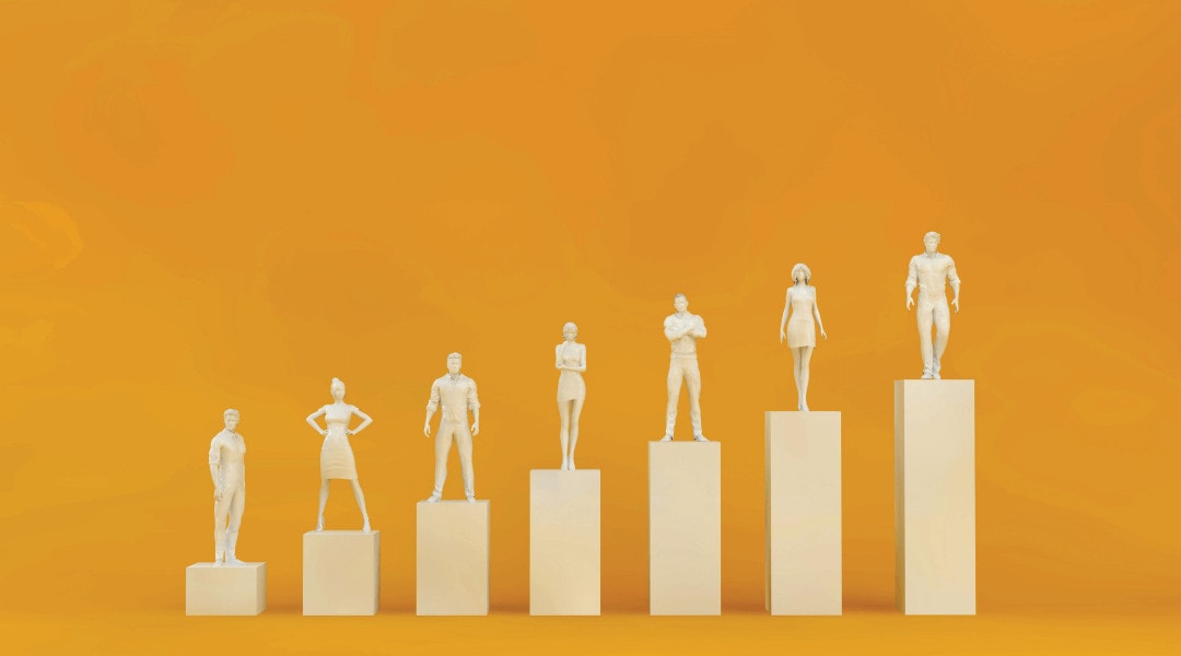 gold professional individual statues standing on gold column blocks arranged in ascending order.