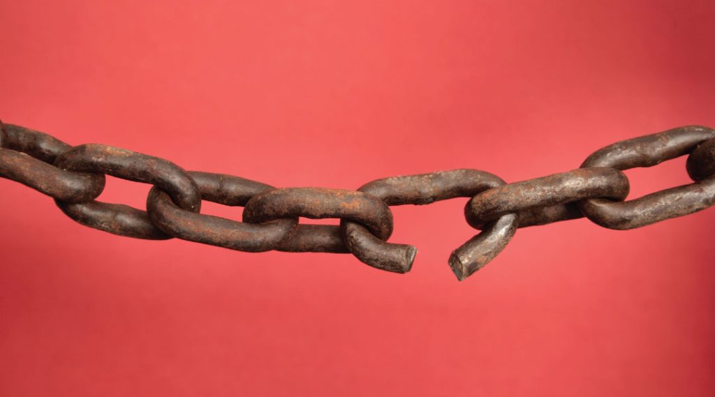 rusted metal link chain with one broken link.