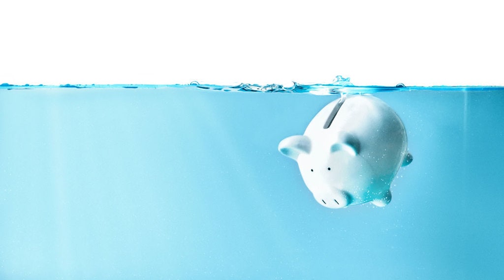 A white porcelain "piggy bank" under water.