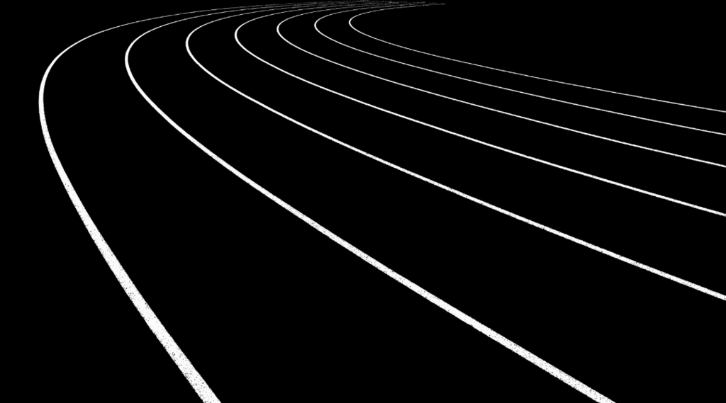 black and white running lanes on a track field