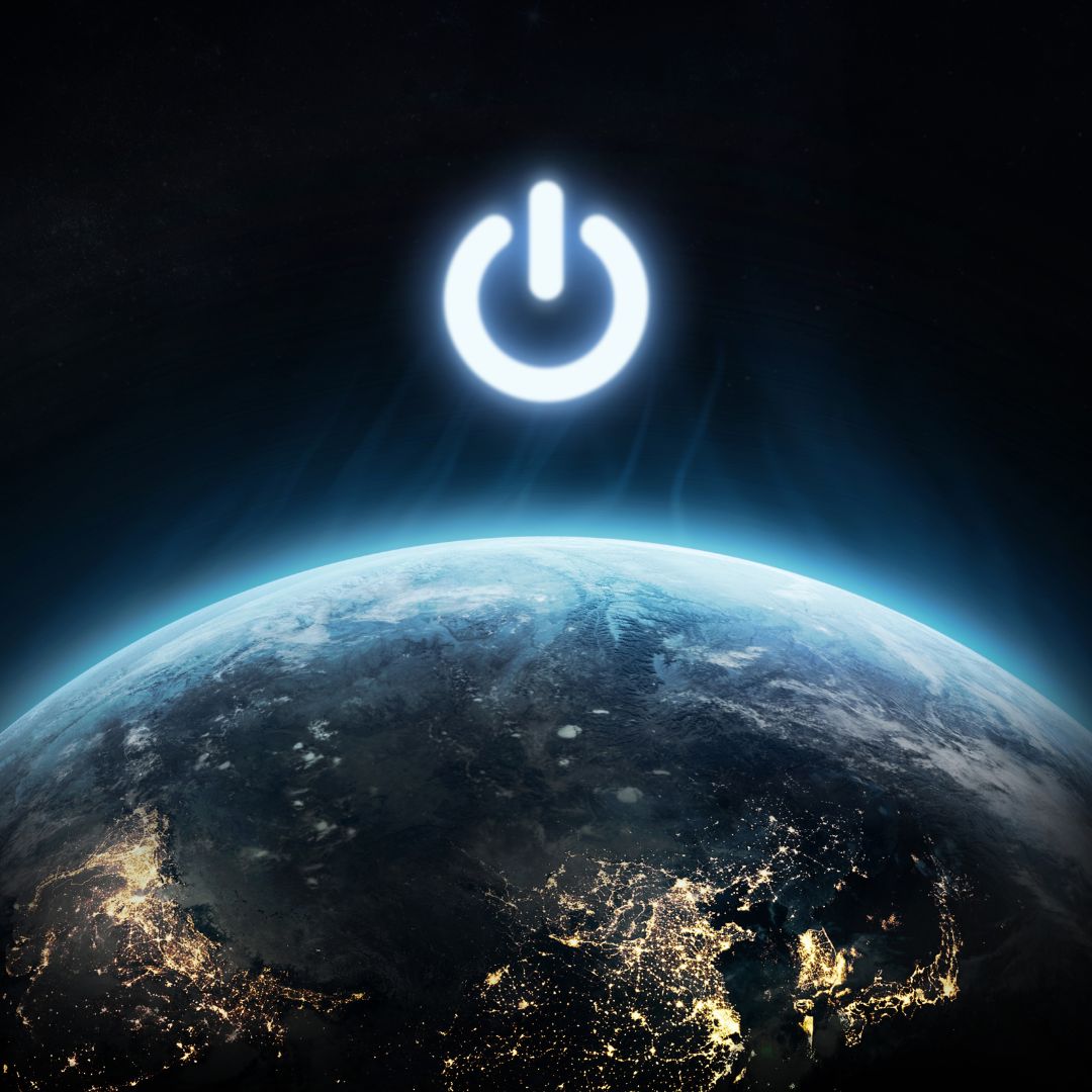 the earth at night time with blue mist coming off leading to a luminescent power button logo