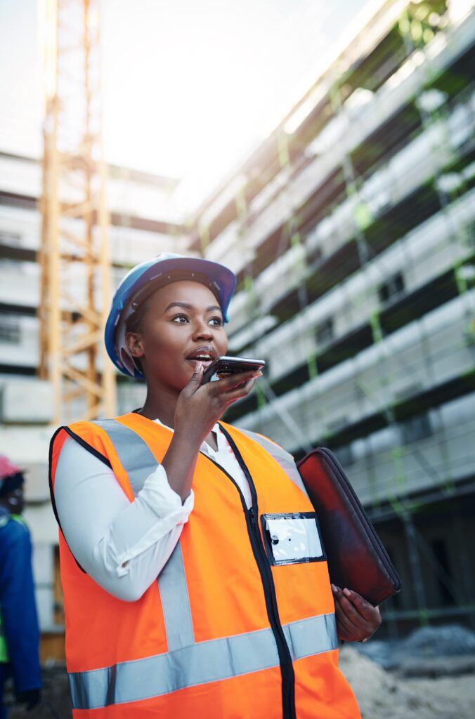 Woman, civil engineer with mobile phone at construction site.