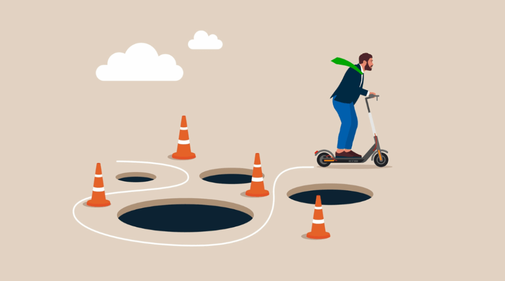 Cartoon businessman on a scooter navigating around potholes and traffic cones, representing common IT mistakes and security risks small businesses face.